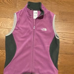 North face vest.  Purple and gray in color.  Lightly worn